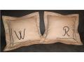 Pillows with embroidered initial
